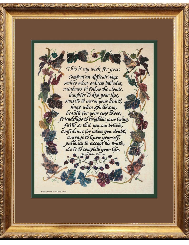 May include: A framed print with a gold ornate frame. The print features a handwritten poem with decorative leaves and birds. The poem's text begins with "This is my wish for you:" and is attributed to Ralph Waldo Emerson.