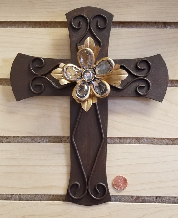 Brown metal jewel scroll cross