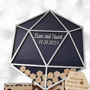 May include: A white ceramic mug with a black handle and the text "But First, Coffee" in a bold, black font. The mug is set against a blurred background, highlighting its clean design.