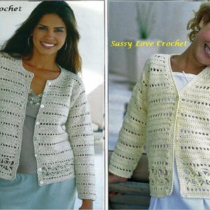 May include: Two crocheted cardigans, one in a light beige color and one in a cream color. Both cardigans have a simple, open stitch pattern and a button closure.