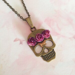Necklace pendant skull purple flowers