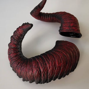 Red demon horns black border image 1