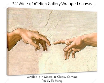 May include: A 24" wide by 16" high gallery wrapped canvas print of Michelangelo's "The Creation of Adam" painting. The print features two hands reaching towards each other, one from God and one from Adam. The print is available in matte or glossy canvas and is ready to hang.