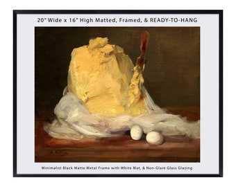 May include: A framed print of a still life painting featuring a large block of butter, a butter knife, and two white eggs on a white cloth. The painting is signed "of Allen" in the lower left corner. The frame is black with a white mat.