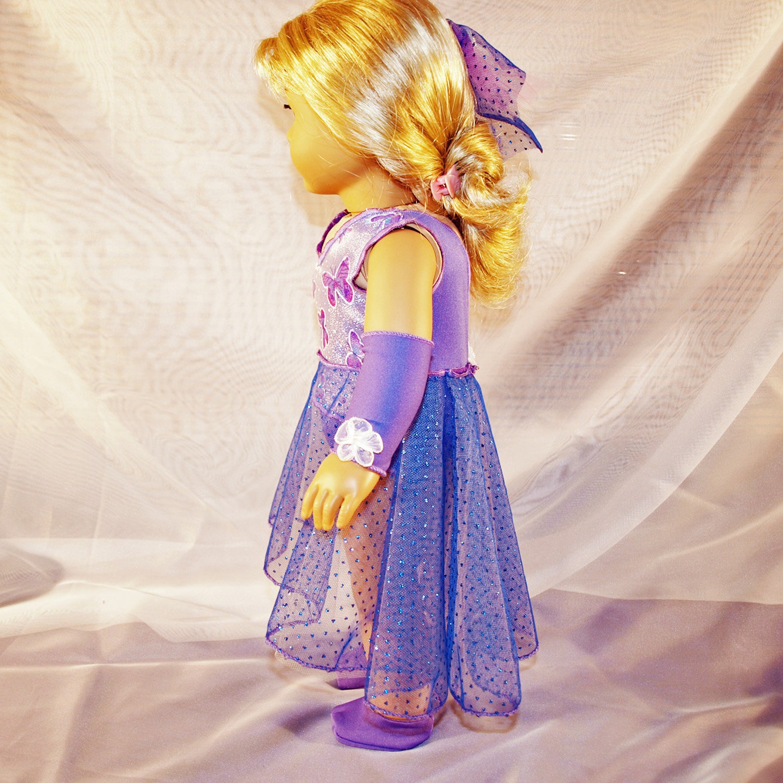 dance costume for ballet or lyrical in shades of purple with hair clip, armbands and shoes, modeled on american girl doll