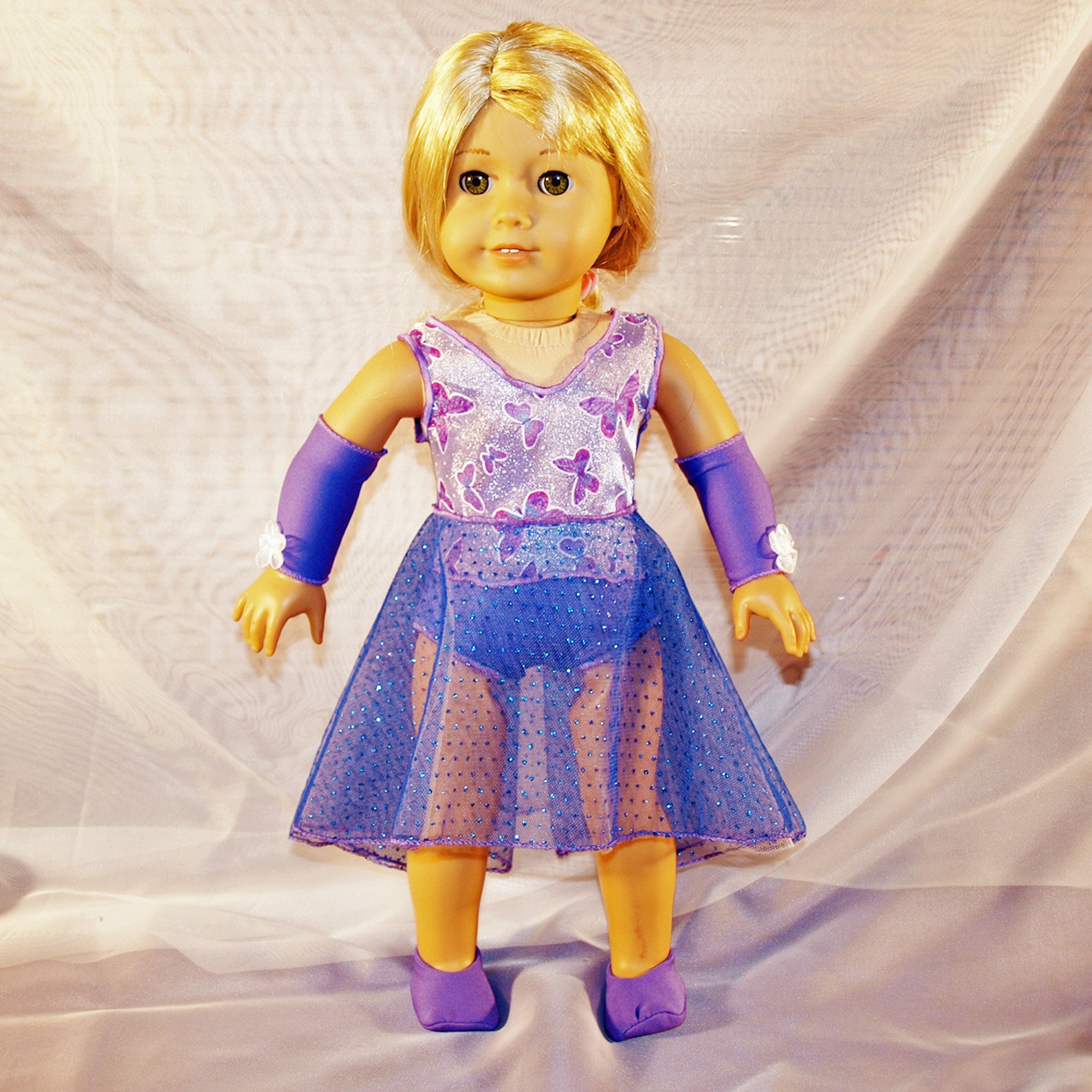 dance costume for ballet or lyrical in shades of purple with hair clip, armbands and shoes, modeled on american girl doll