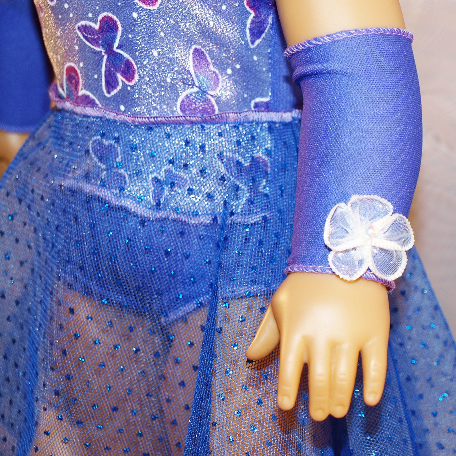 dance costume for ballet or lyrical in shades of purple with hair clip, armbands and shoes, modeled on american girl doll