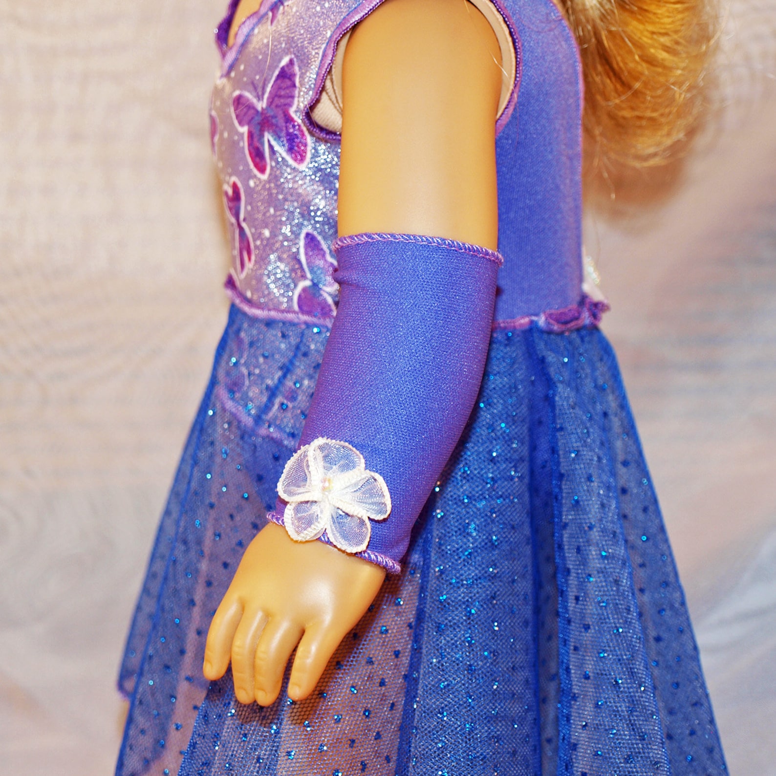 dance costume for ballet or lyrical in shades of purple with hair clip, armbands and shoes, modeled on american girl doll