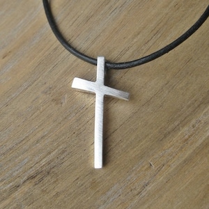 Silanus“ –silver cross pendant on leather cord