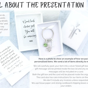 May include: A silver key chain with a green shamrock charm and a small silver butterfly charm. The key chain is packaged in a white gift box with a white card that says "Good luck clever girl You will be amazing xxx". The image also shows a white organza bag and a white card with a handwritten message.