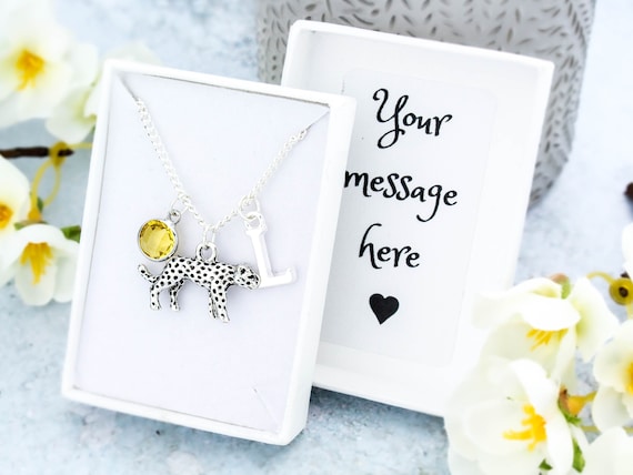 Snow outlet leopard pendant