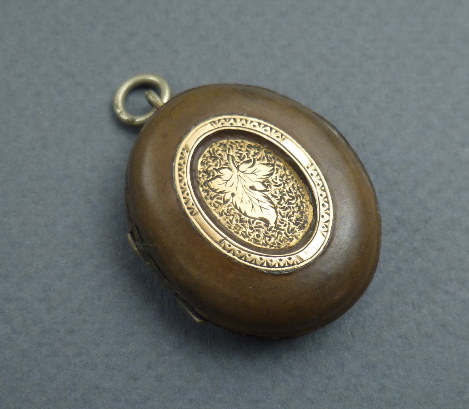 Gutta Percha With Gold Locket Etsy