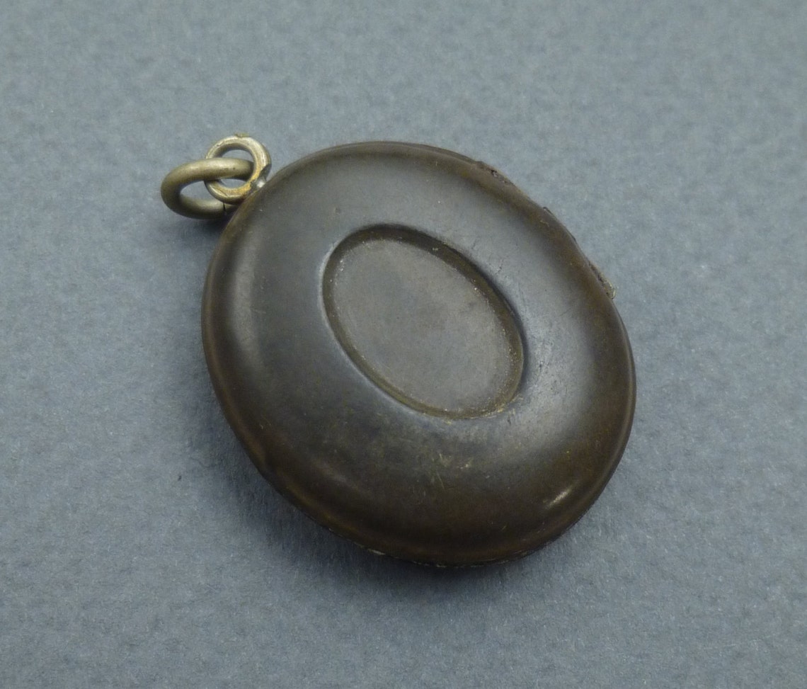 Gutta Percha With Gold Locket Etsy