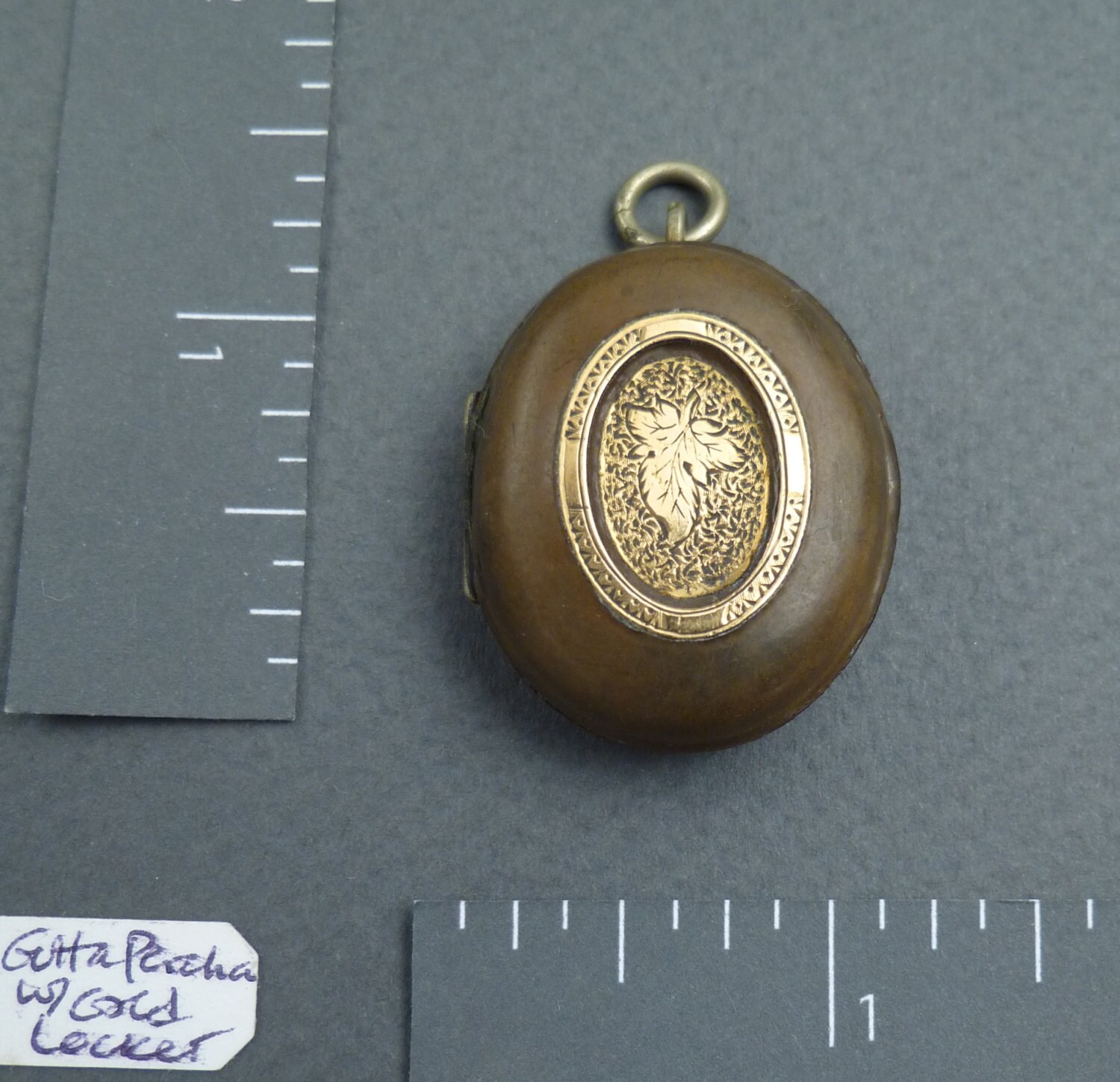 Gutta Percha With Gold Locket Etsy