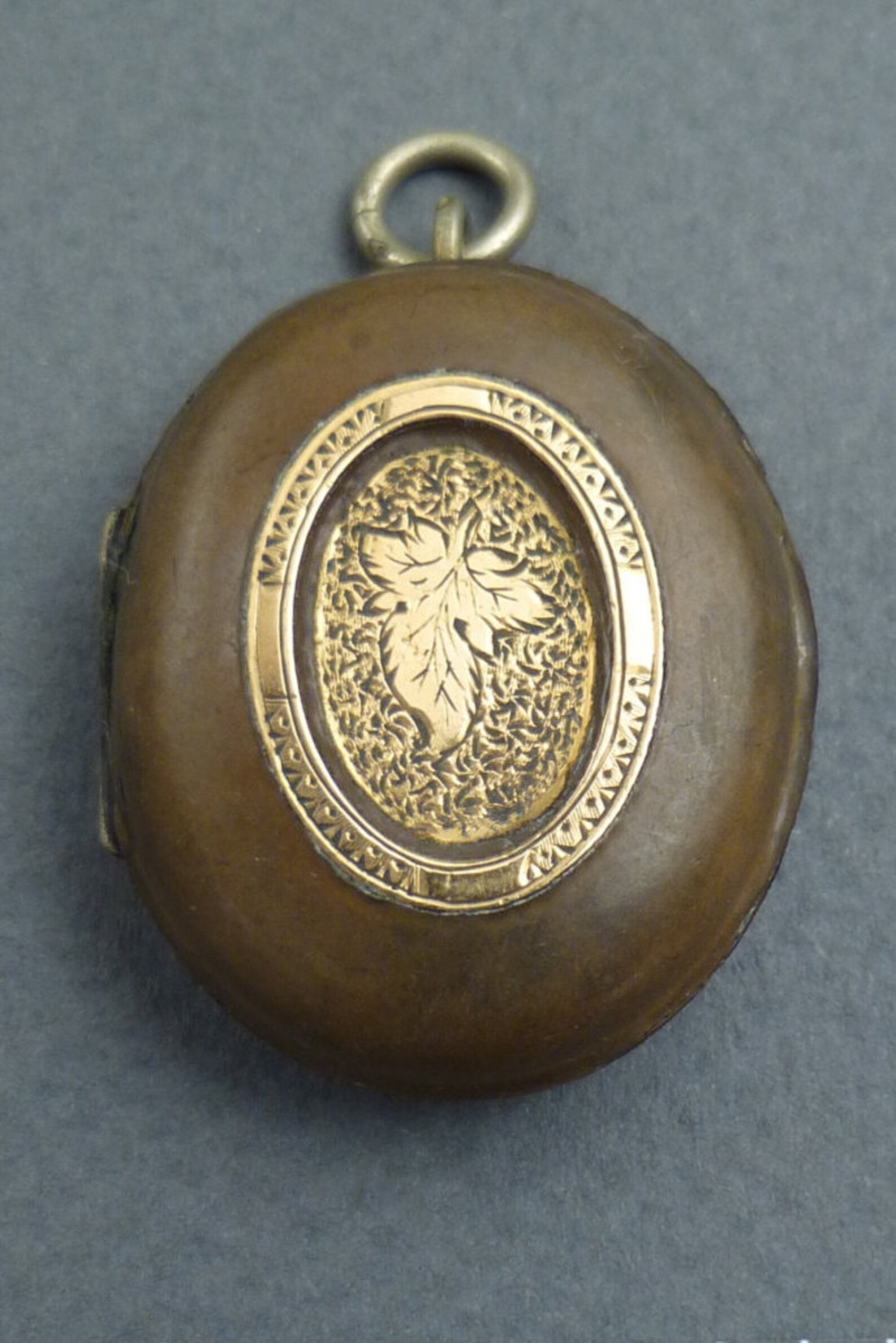 Gutta Percha With Gold Locket Etsy