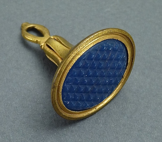 Gilt and Vauxhall glass fob