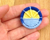 Ocean sunset inspired Dorset Button brooch, handmade Wanderlust gift