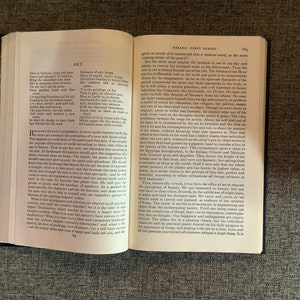 May include: A page from a book with the title "Essays: First Series" and the text "Art" in bold. The text discusses the progression of the soul and the role of art in expressing the spirit of the age.