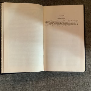 May include: A book titled "Essays (First Series)" by Ralph Waldo Emerson. The book was first published in 1841 and includes essays derived from lectures given by Emerson in the years prior.