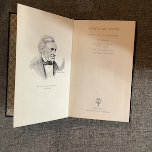 May include: An open book with a black and white illustration of Ralph Waldo Emerson on the left page. The right page has the title "Essays and Poems" by Ralph Waldo Emerson, with the text "Selected and Arranged by G. F. Maine" and "With an Introduction by Delancey Ferguson". The bottom of the right page says "Collins, London and Glasgow".