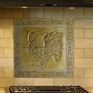 Ceramic bas relief cockerel backsplash in wheat glaze and celtic knot border.