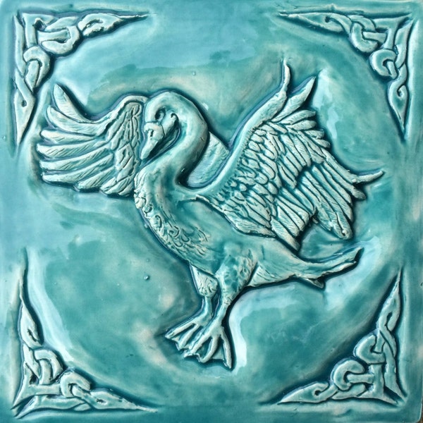 Handmade Celtic swan Ceramic bas relief tile in turquoise glaze