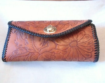 Hand tooled leather clutch purse in a flower design Made in Montana