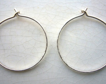 whoops! ...silver 1" hoop earrings, sterling silver hammered on edge