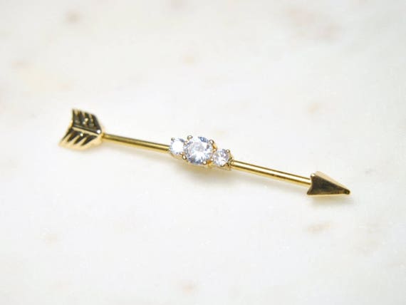 Gold arrow industrial piercing clearance