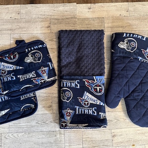 Tennessee titans themed 4 piece kitchen gift set.