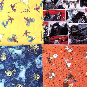 May include: A collection of four fabric swatches featuring distinct prints: a yellow background with Curious George characters, a black and white comic book panel print, a blue Monsters Inc. pattern, and an orange Peanuts autumn leaf print.
