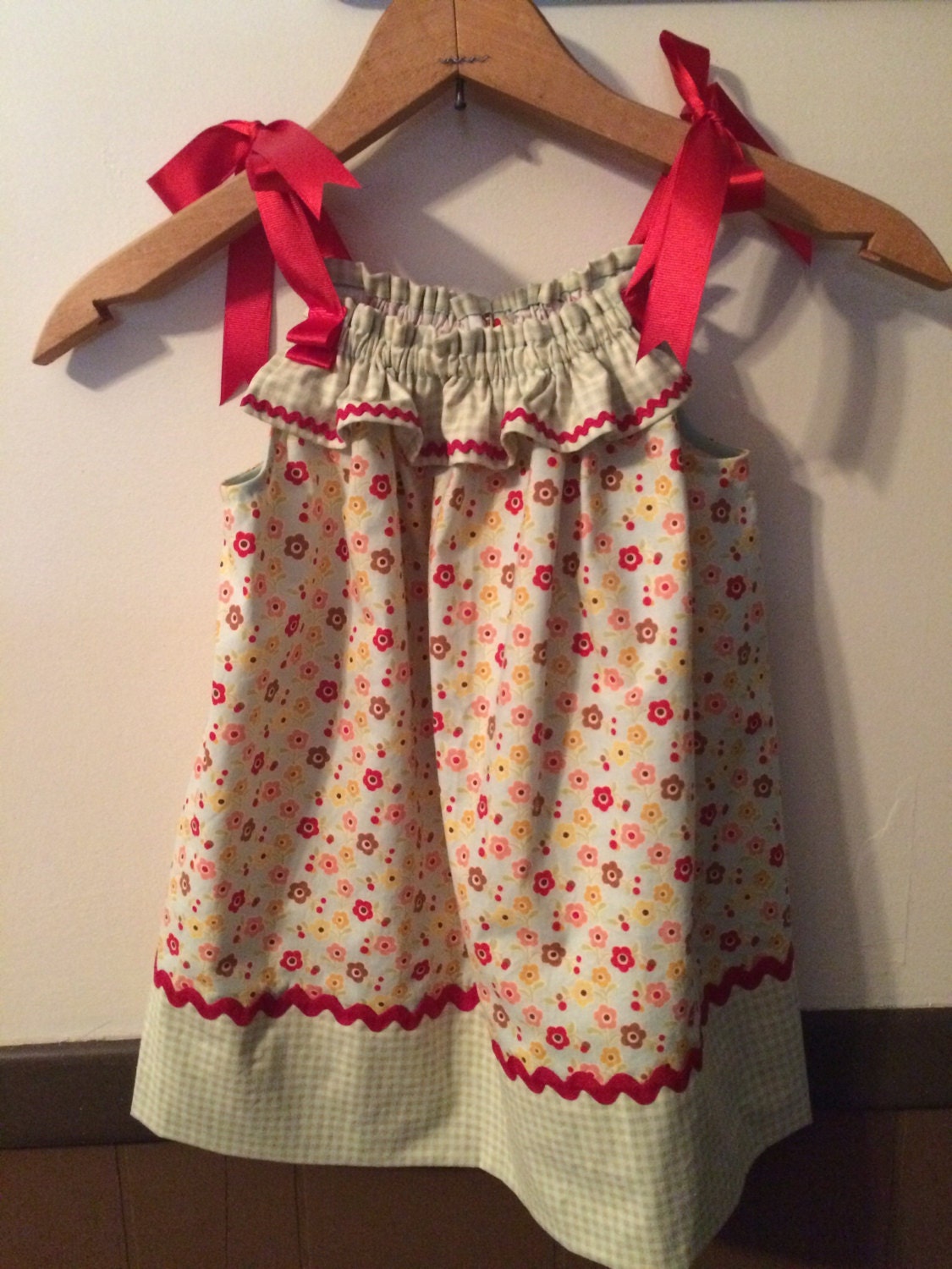 Pillowcase dress with ribbon ties at the shoulders. Etsy