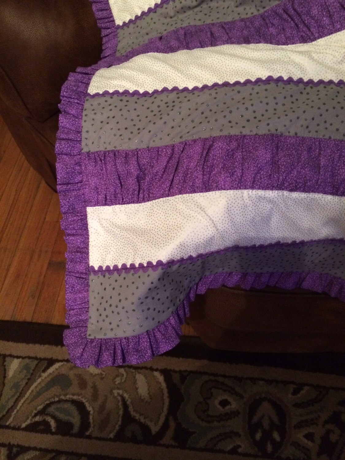 Modern striped quilt with a ruffle binding. Etsy