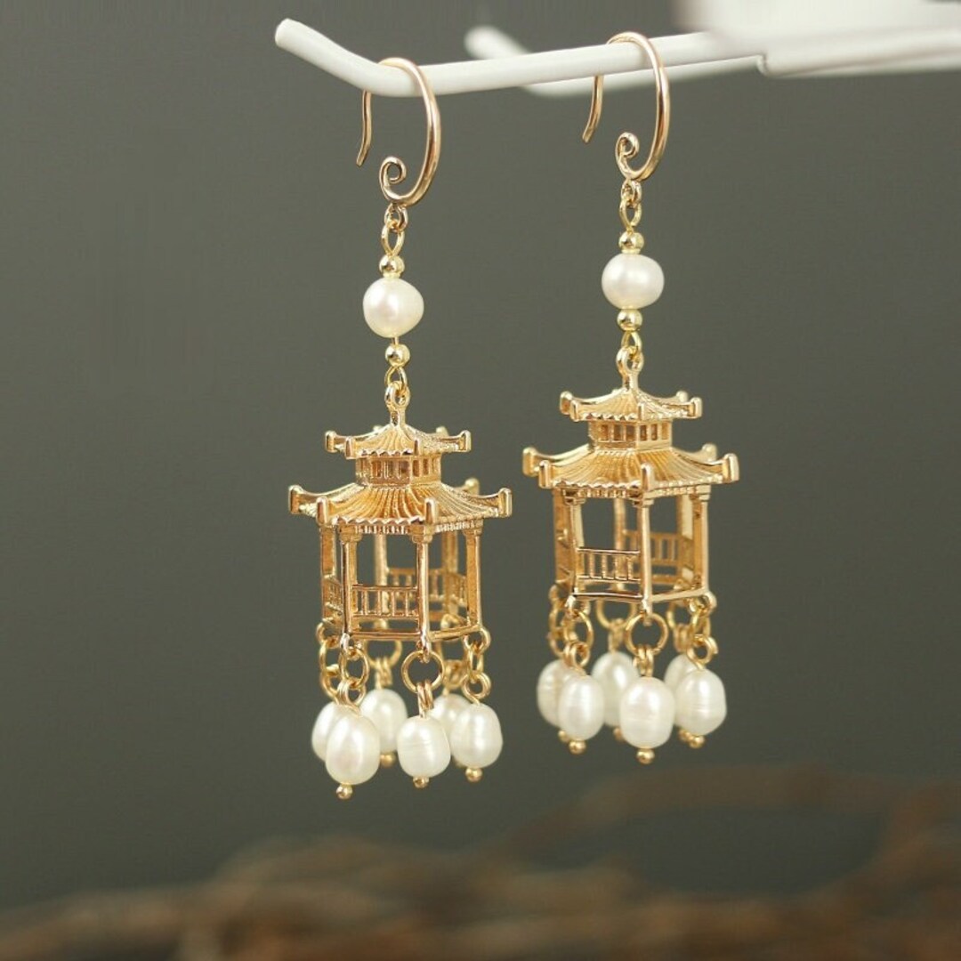 Pagoda cross earrings deals