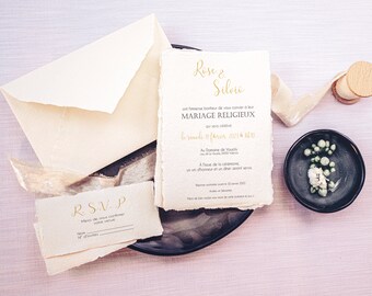 Wedding invitation in handmade craft paper with torn edges and wax seal