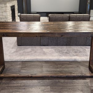 Long thin bar height table for theater seating. Espresso reclaimed wood high top table handmade to order in hard to find sizes.
