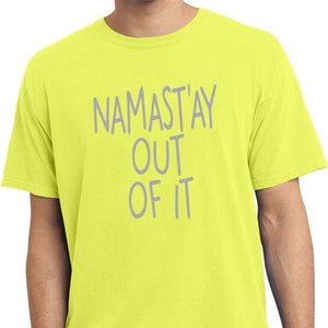 May include: A neon yellow t-shirt with the text "Namast'ay Out Of It" in gray lettering.
