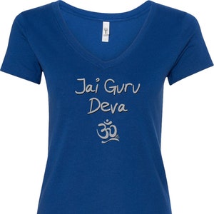 May include: A royal blue v-neck t-shirt with the text "Jai Guru Deva" and an Om symbol in gray.