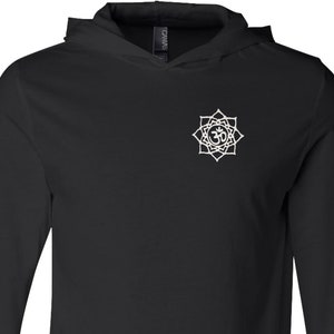 May include: Black long-sleeve hooded shirt with a white Om symbol in a mandala design on the front.