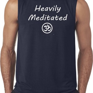 May include: A navy blue sleeveless shirt with the text "Heavily Meditated" and an Om symbol in white.