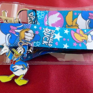 Disney Donald and Daisy Duck lanyard, charm & ID holder Bus pass/keys/neck strap/gift