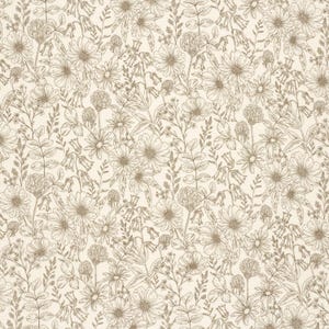 May include: A cream-colored fabric with a detailed floral pattern. The design features various flowers, leaves, and stems in a light brown color, creating a natural and botanical theme. The pattern is evenly distributed across the fabric.