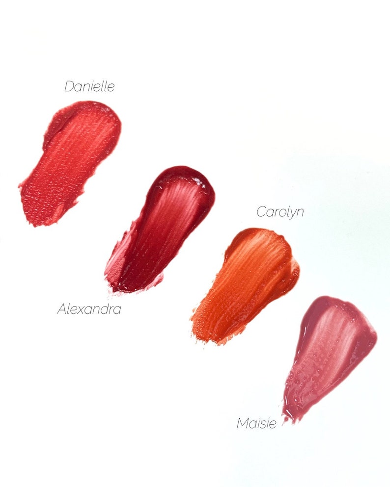 May include: Five lipstick swatches on a white background. The swatches are labeled "Danielle", "Alexandra", "Carolyn", "Maisie".