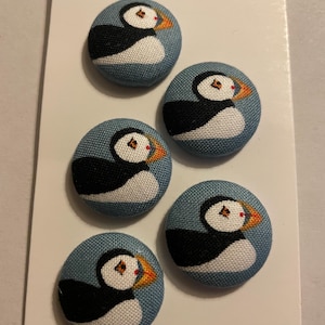 Handmade fabric buttons in a puffin fabric
