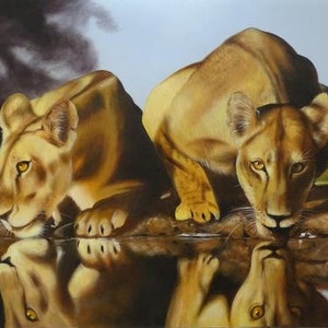 May include: A painting of two lions drinking from a waterhole. The lions are brown and have a light brown mane. The waterhole is a light blue color. The background is a light blue sky with some clouds.