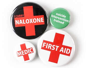 Sencillo: Botón de primeros auxilios, insignia del médico, botón de naloxona que llevo y botón entrenado de intervención suicida: ¡Use sus habilidades!