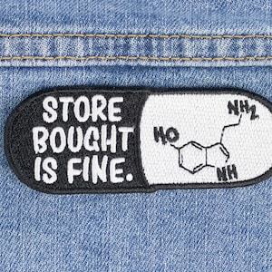 May include: Black and white embroidered patch with the text "Store bought is fine." and a chemical structure diagram.
