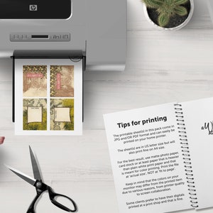May include: Printable digital paper sheets with a vintage aesthetic. The sheets feature a distressed background with floral and geometric patterns. The text "Tips for printing" is visible on a white page with a spiral binding.