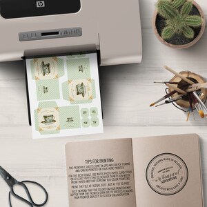 May include: Printable sheets of teacup and teapot illustrations in a vintage style. The sheets are printed on a white background with green and gold accents. The text on the sheet reads "Tips for Printing". The printable sheets come in JPG and/or PDF format and can be printed on your home printer.