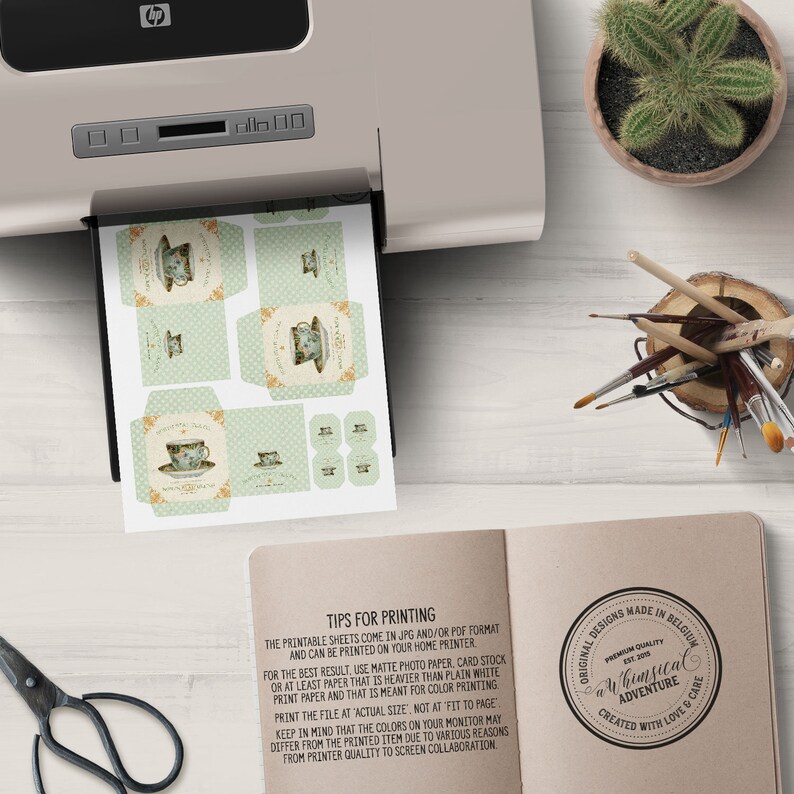 May include: Printable sheets of teacup and teapot illustrations in a vintage style. The sheets are printed on a white background with green and gold accents. The text on the sheet reads "Tips for Printing". The printable sheets come in JPG and/or PDF format and can be printed on your home printer.